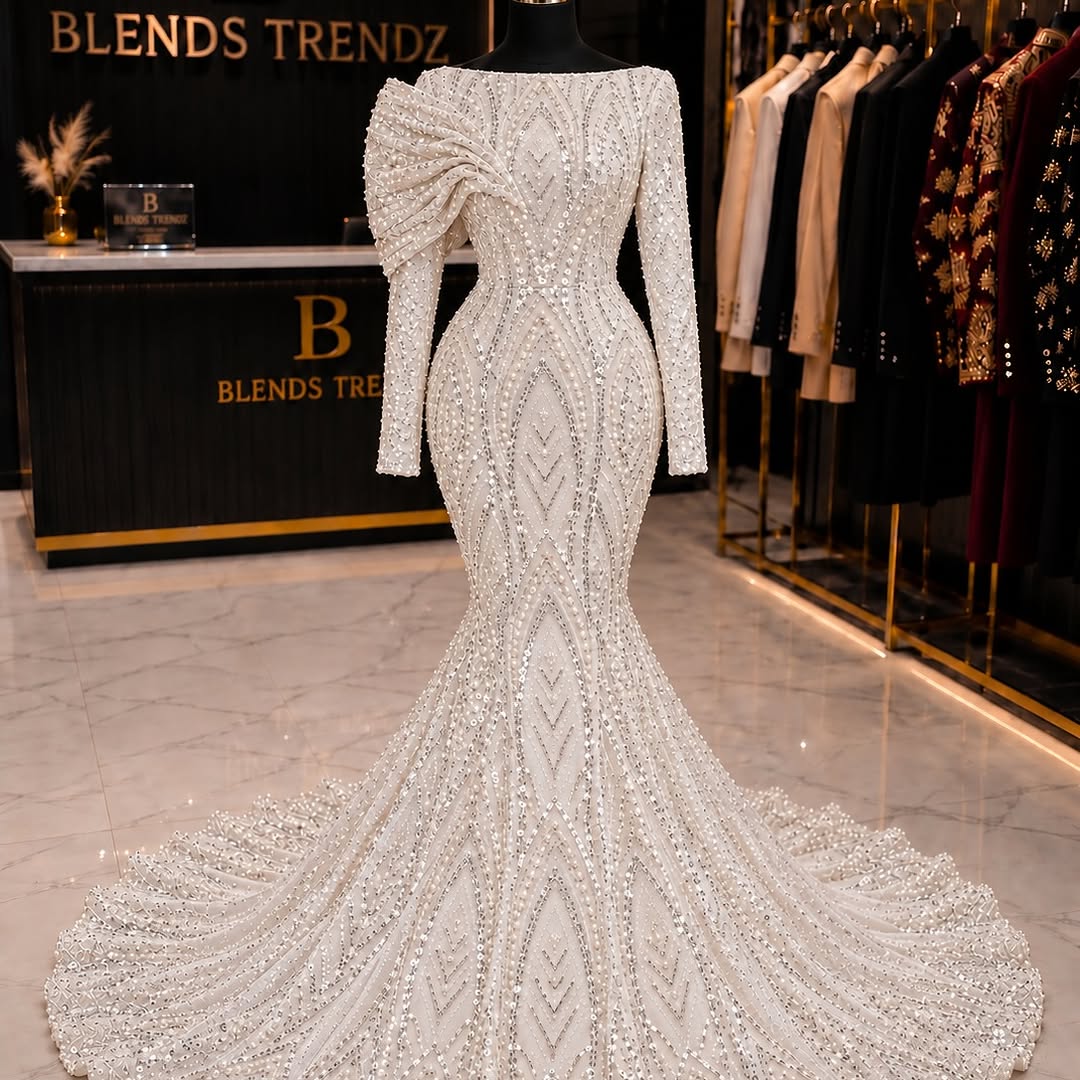 Silver couture gown at Blends Trendz